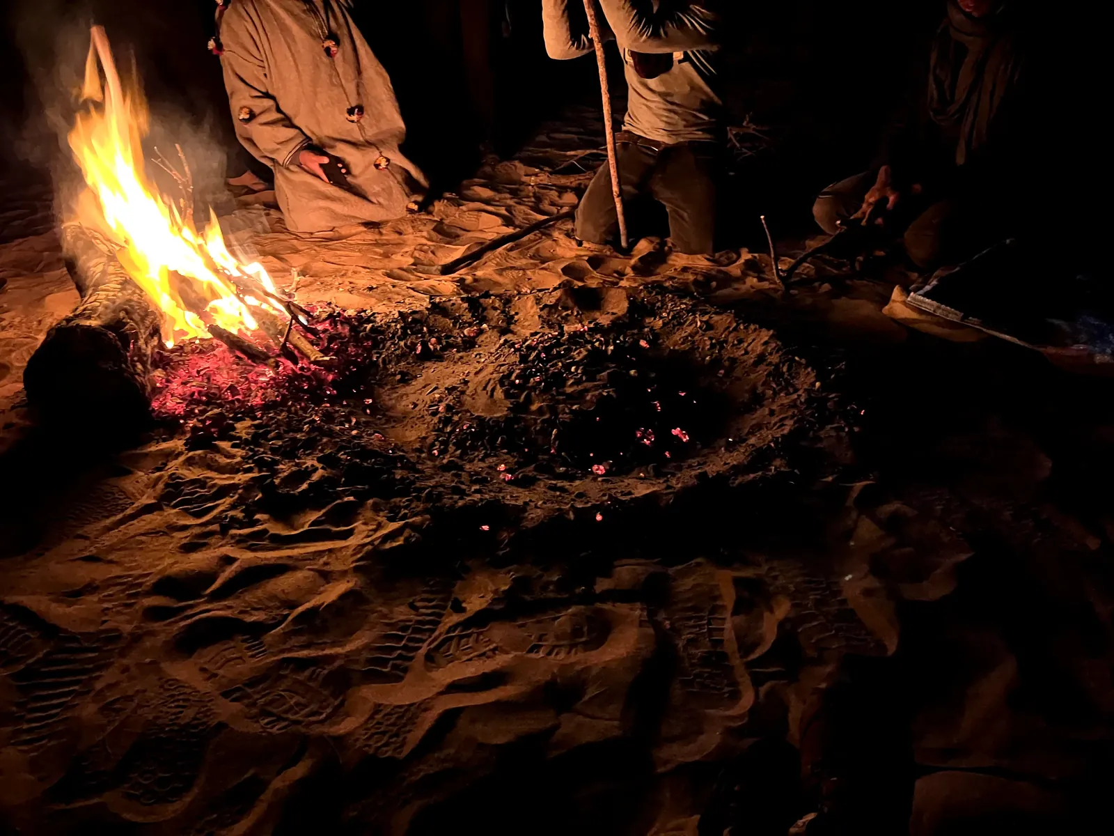 Campfire at night in a desert camp in Morocco